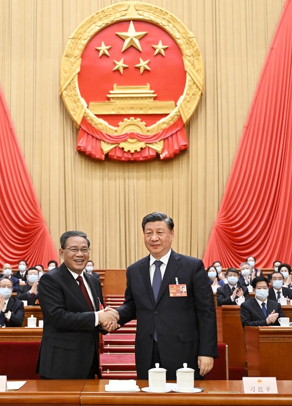 十四届全国人大一次会议举行第四次全体会议 根据国家主席习近平的提名决定李强为国务院总理 国家主席习近平签署主席令任命